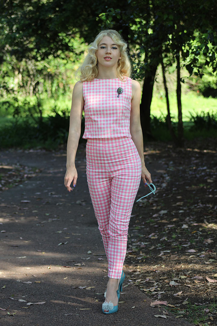 GracefullyVintage in a pink top and pants