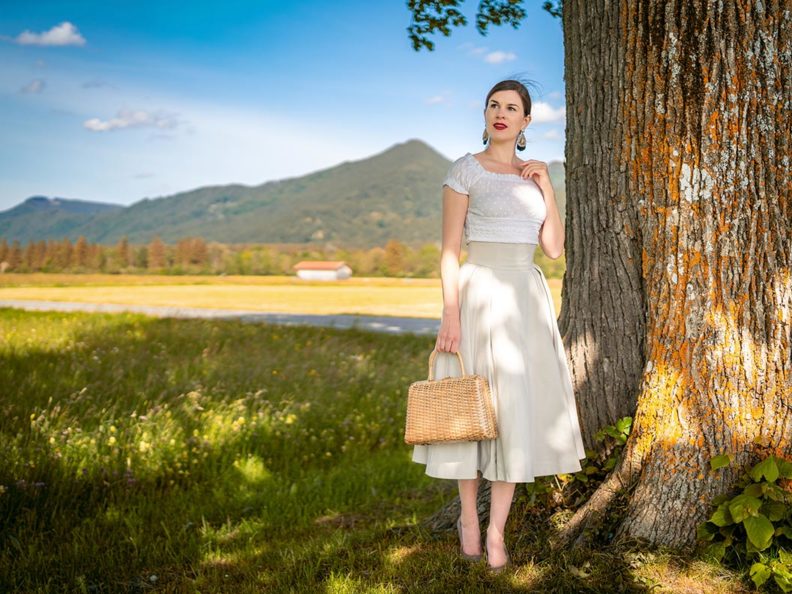 RetroCat wearing a romantic retro outfit in the Bavarian countryside