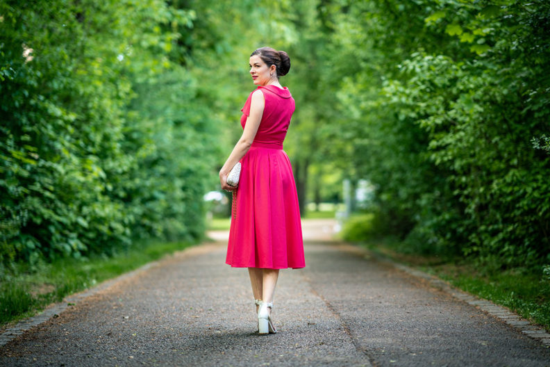 RetroCat with a coral-coloured retro dress by Miss Candyfloss