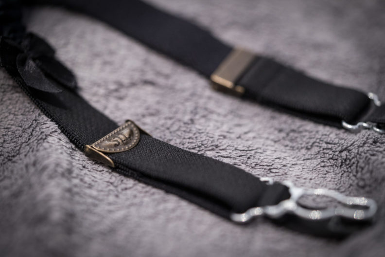 Detail shot of two suspenders