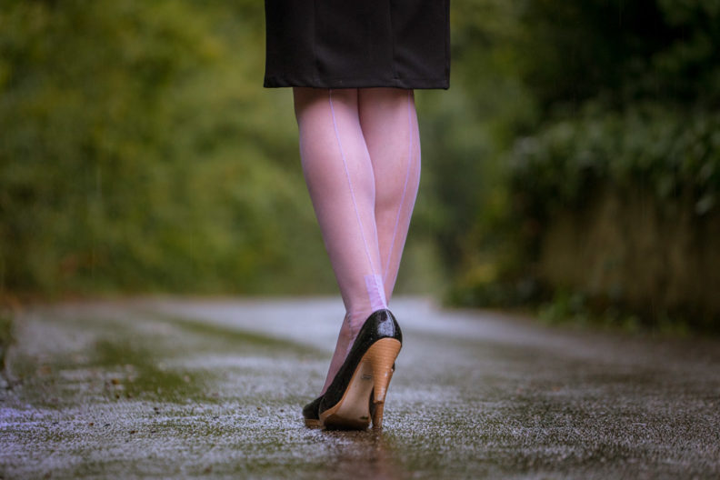 RetroCat wearing lilac nylons in the rain