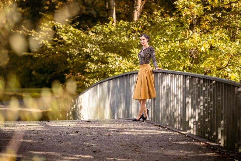 How to style leopard print: RetroCat wearing a leopard top and yellow skirt in autumn