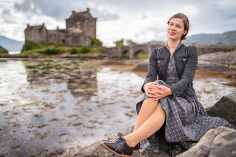 RetroCat with flat lace-up shoes and a retro dress in Scotland