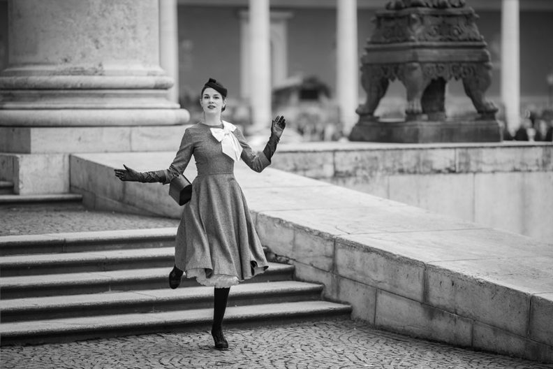 RetroCat wearing lace-up ankle boots and a grey dress for autumn