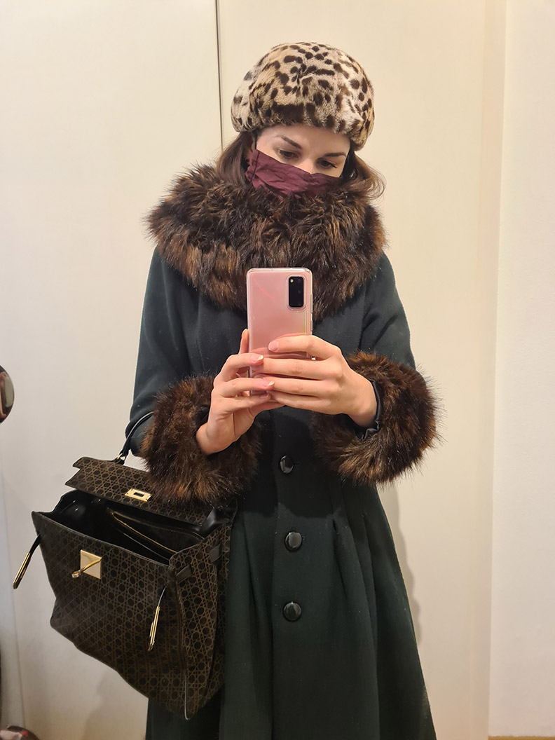 RetroCat wearing the Pearl Coat by Collectif Clothing and a mask