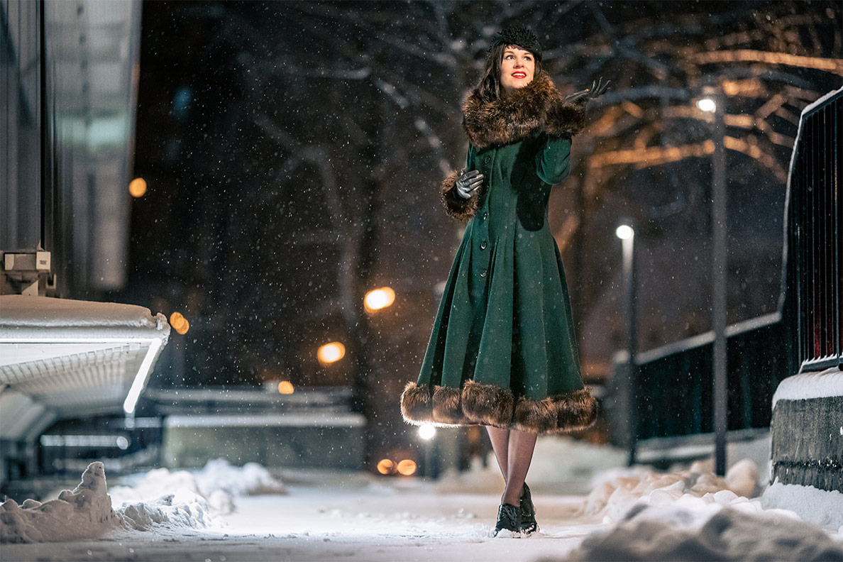 RetroCat wearing the glamorous Pearl Coat in a winter night