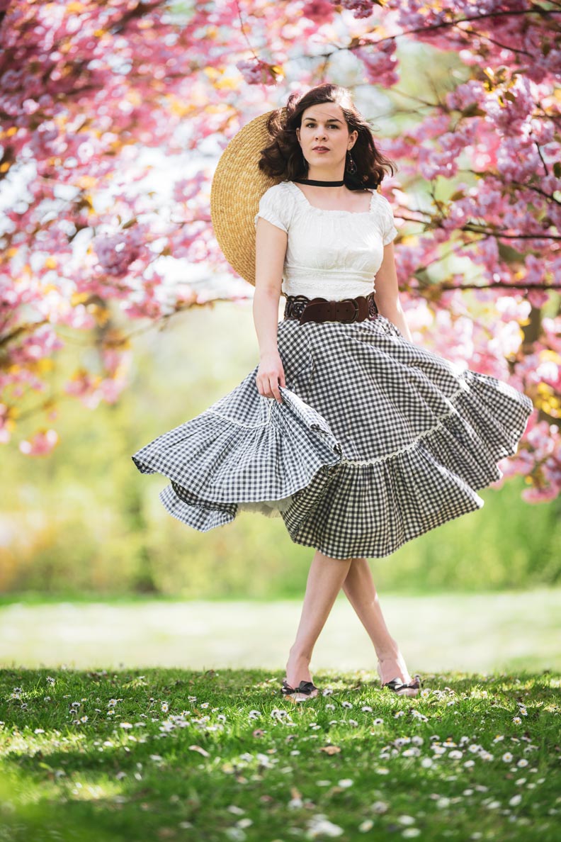 RetroCat wearing ballet flats and a vichy skirt in spring