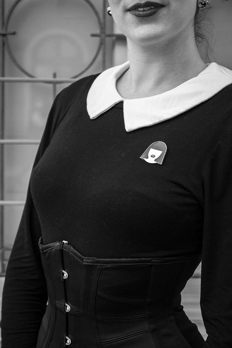 RetroCat wearing a black underbust corset by Agent Provocateur