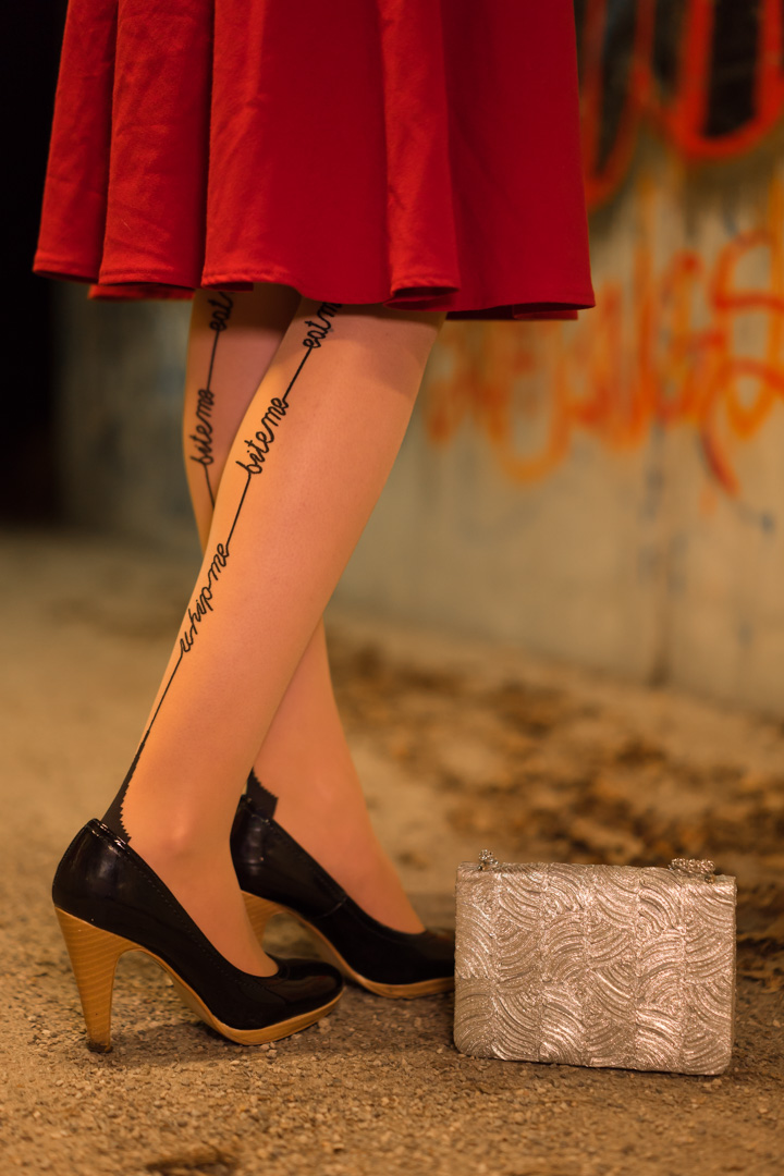 RetroCat wearing the Tease me stockings by Agent Provocateur and a red skirt