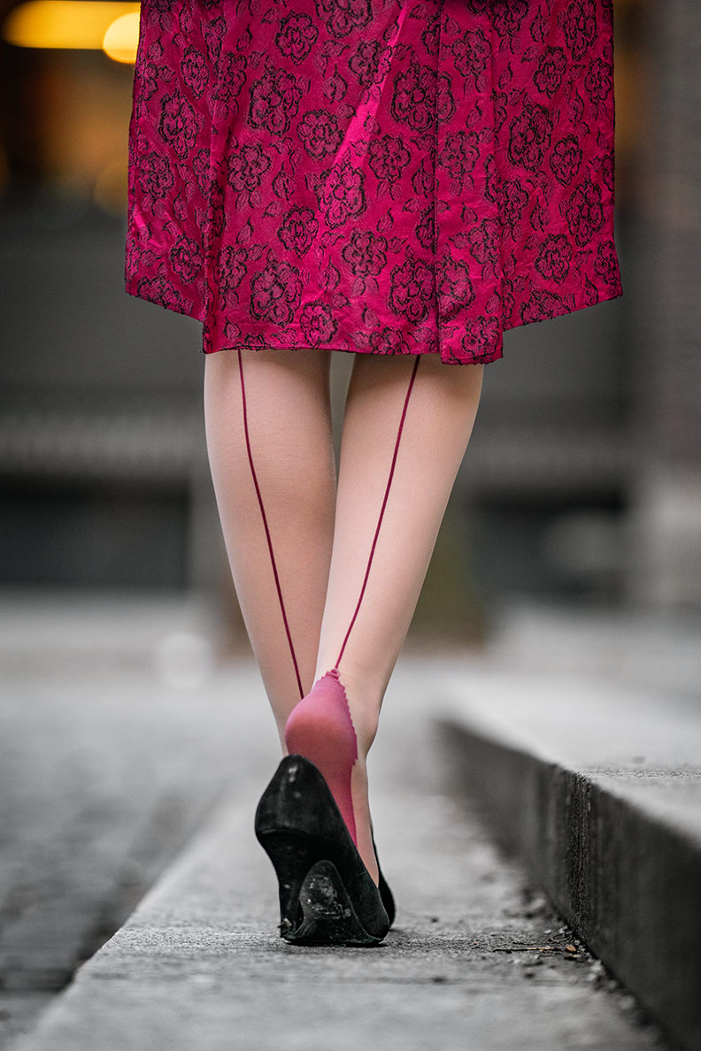 RetroCat wearing colourful seamed stockings by What Katie Did