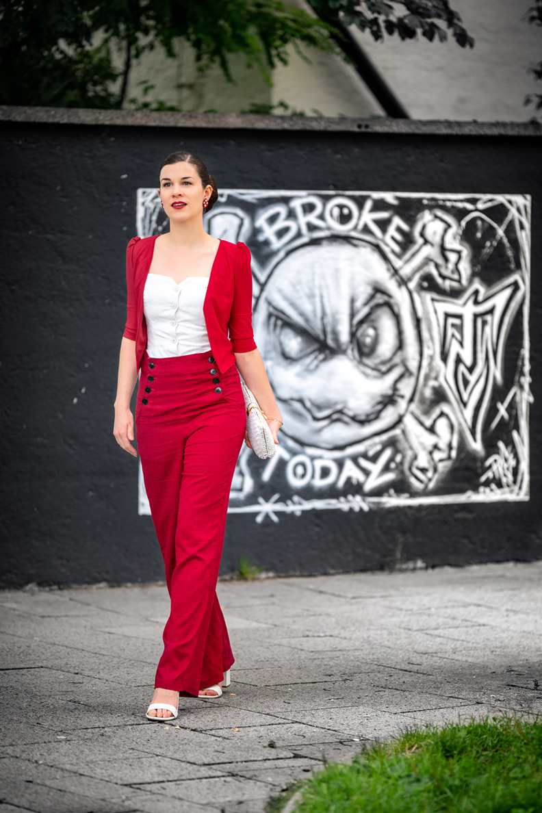 Streetstyle: RetroCat wearing red retro trousers and a white top