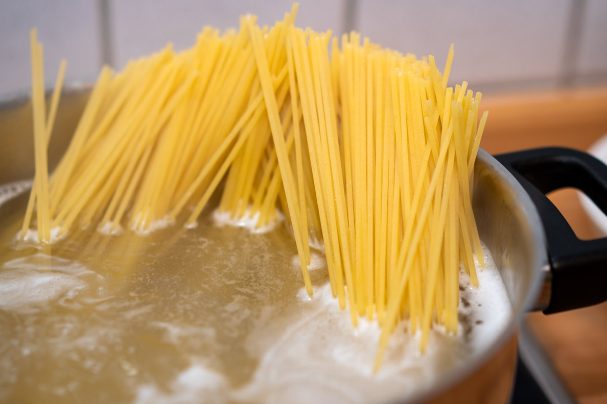 Spaghetti cooking in water