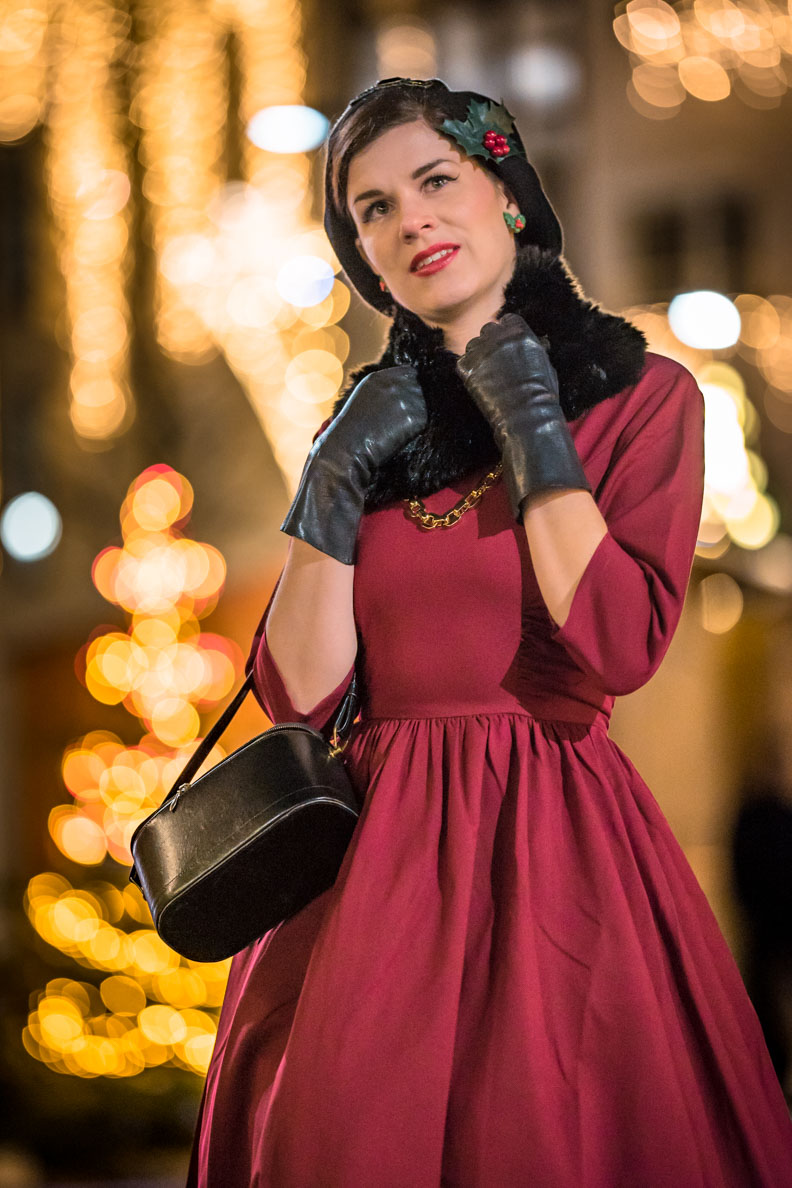 RetroCat wearing a red dress by Zoe Vine and a faux-fur stole