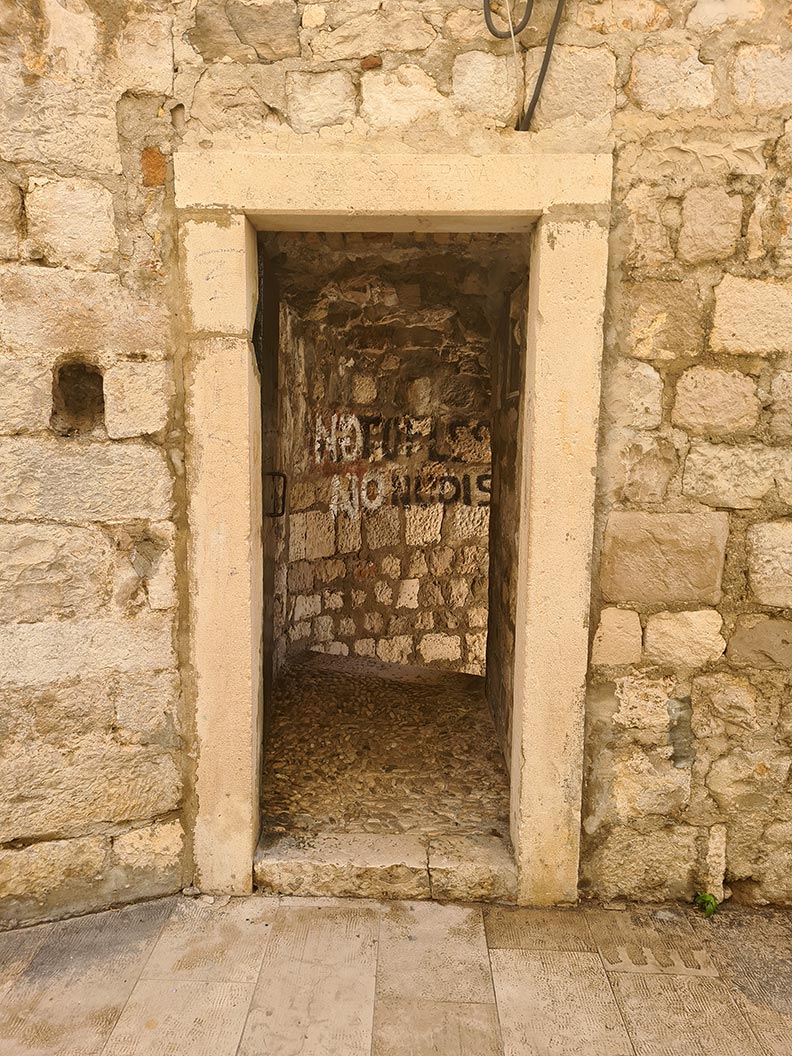 The entrance to the Buza Bar in the city walls of Dubrovnik