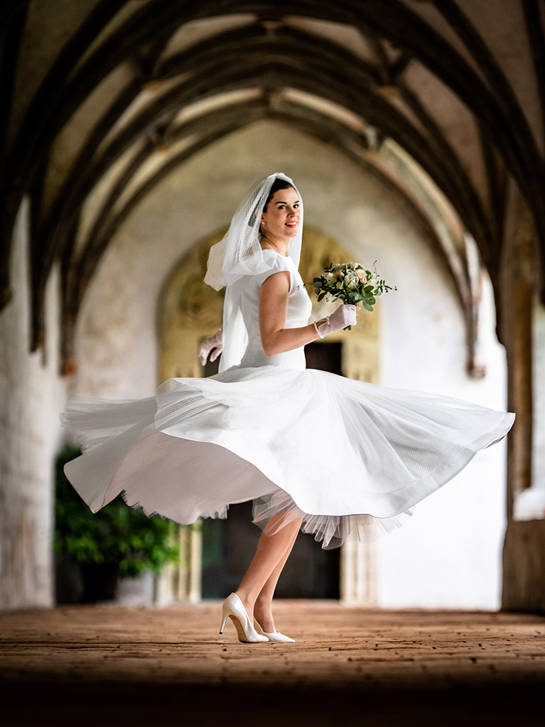 RetroCat wearing her 50s wedding dress with petticoat inspired by Audrey Hepburn in Funny Face