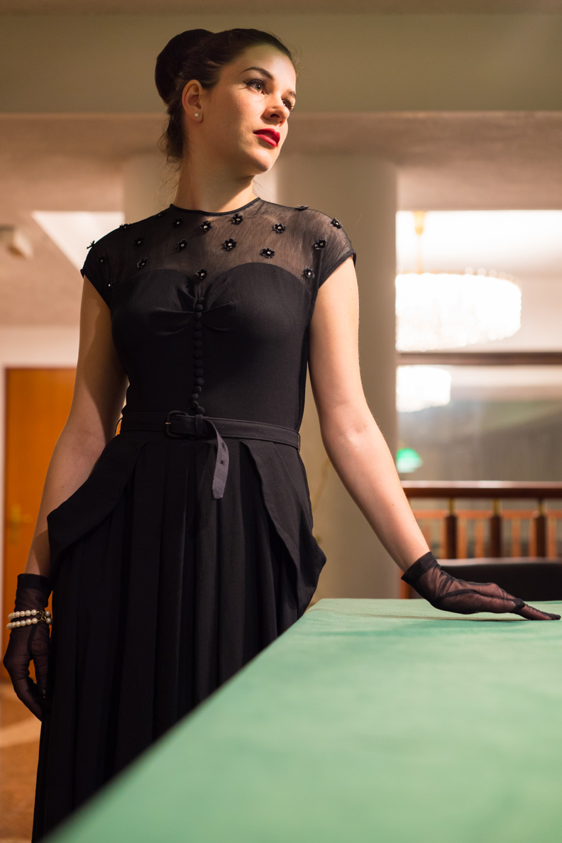 RetroCat wearing a glamorous 1940s party dress