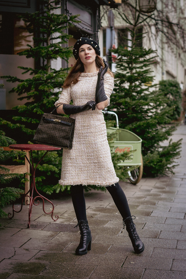 Winter must-haves: RetroCat wearing long leather gloves with her winter dress