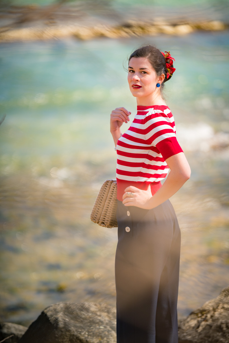 RetroCat with palazzo pants and shirt by the water