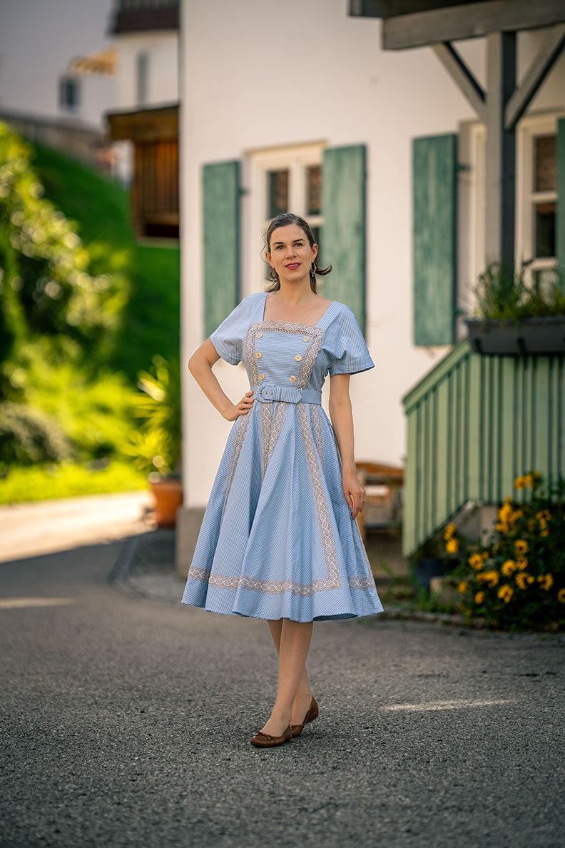 RetroCat in a light blue Grandmacore-style dress