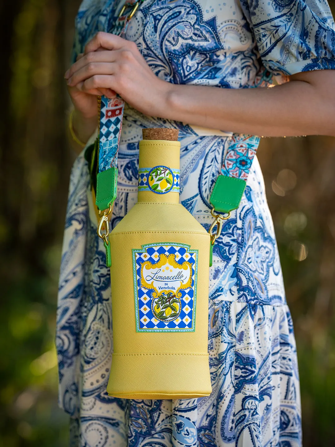 RetroCat with a summer handbag in the shape of a limoncello