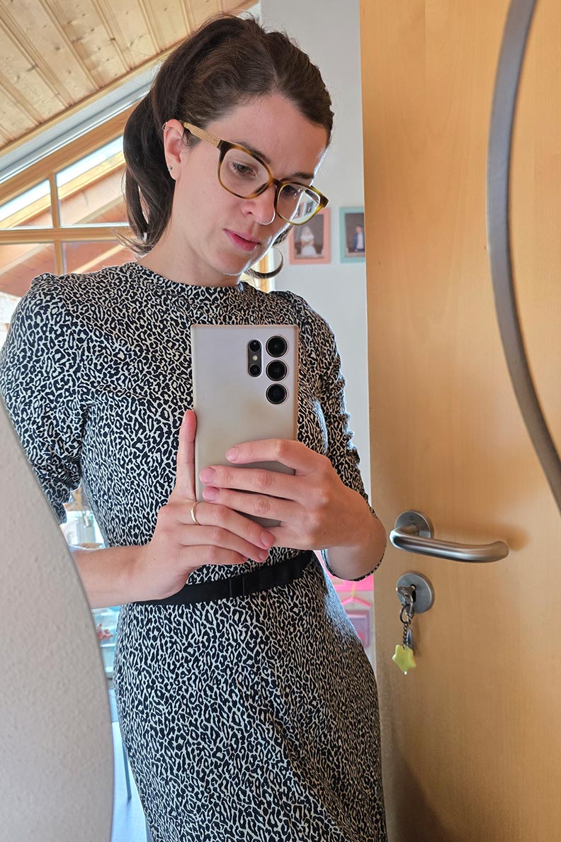 RetroCat in a leopard dress perfect for late summer