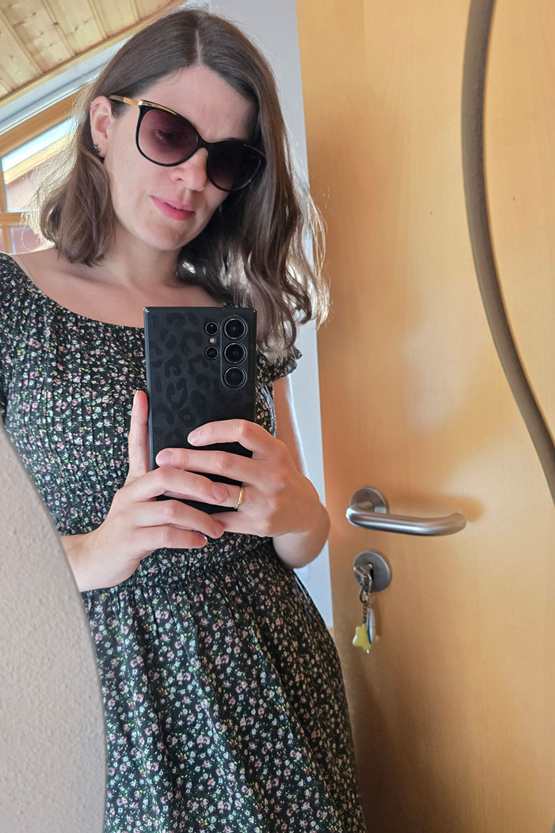 RetroCat wearing a light summer dress