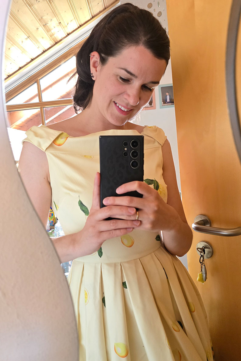 RetroCat in a yellow sundress with lemons