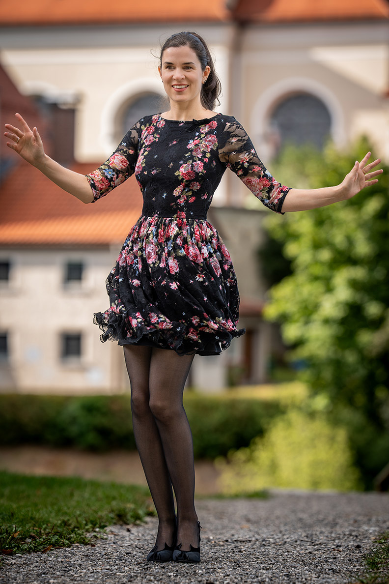 RetroCat wearing a retro dress with rose pattern by Wheels & Dollbaby